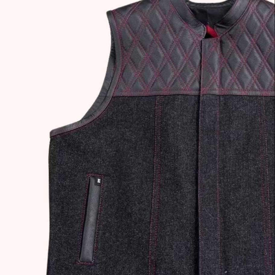 Black denim riding vest detail