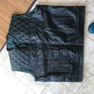 Emerald leather riding vest detail