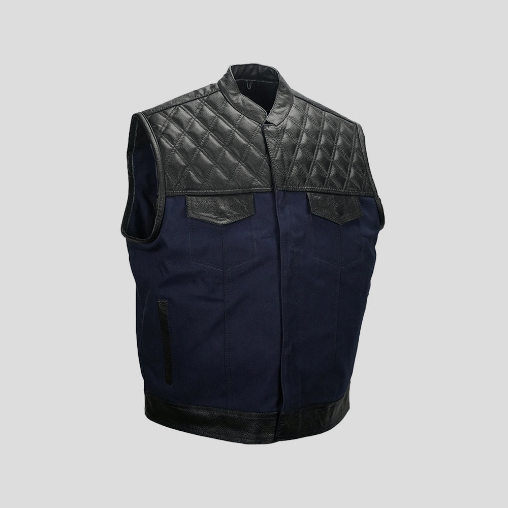 Blue canvas vest with quilted cowhide shoulders