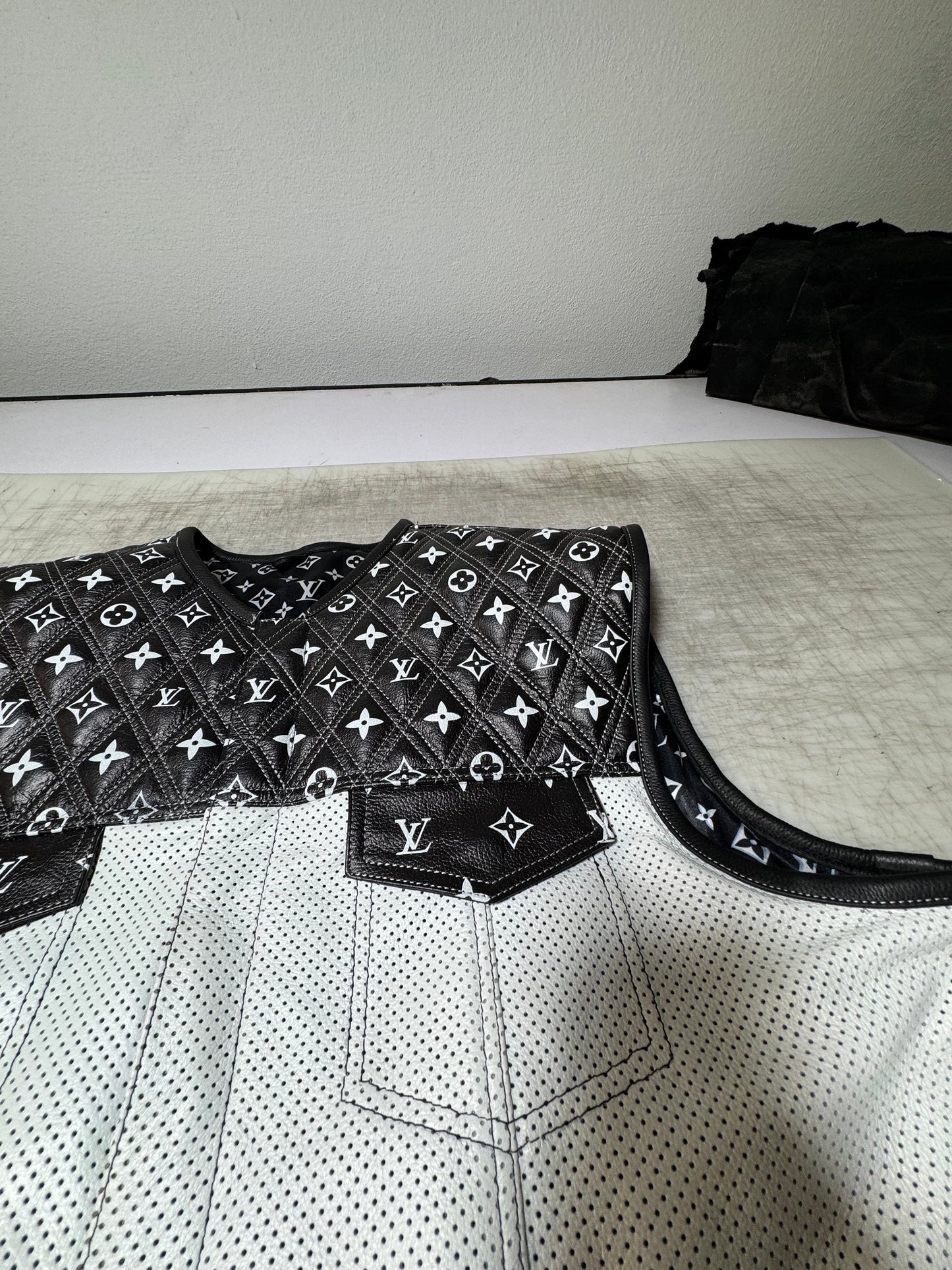 LO*UIS VUIT**N WHITE LEATHER DIAMOND STITCHING WITH BLACK PERFORATED LEATHER