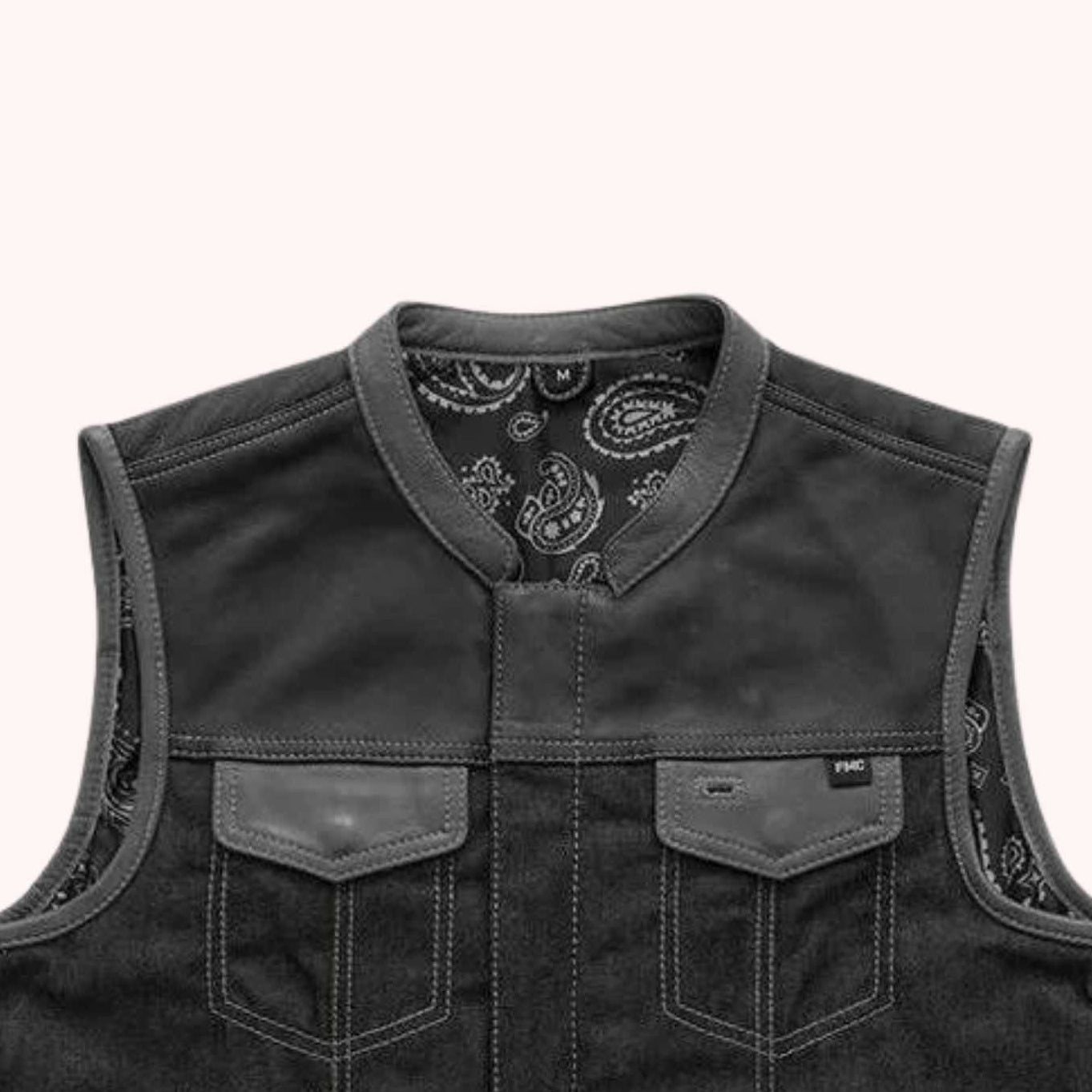 Charcoal denim vest with gray leather accents