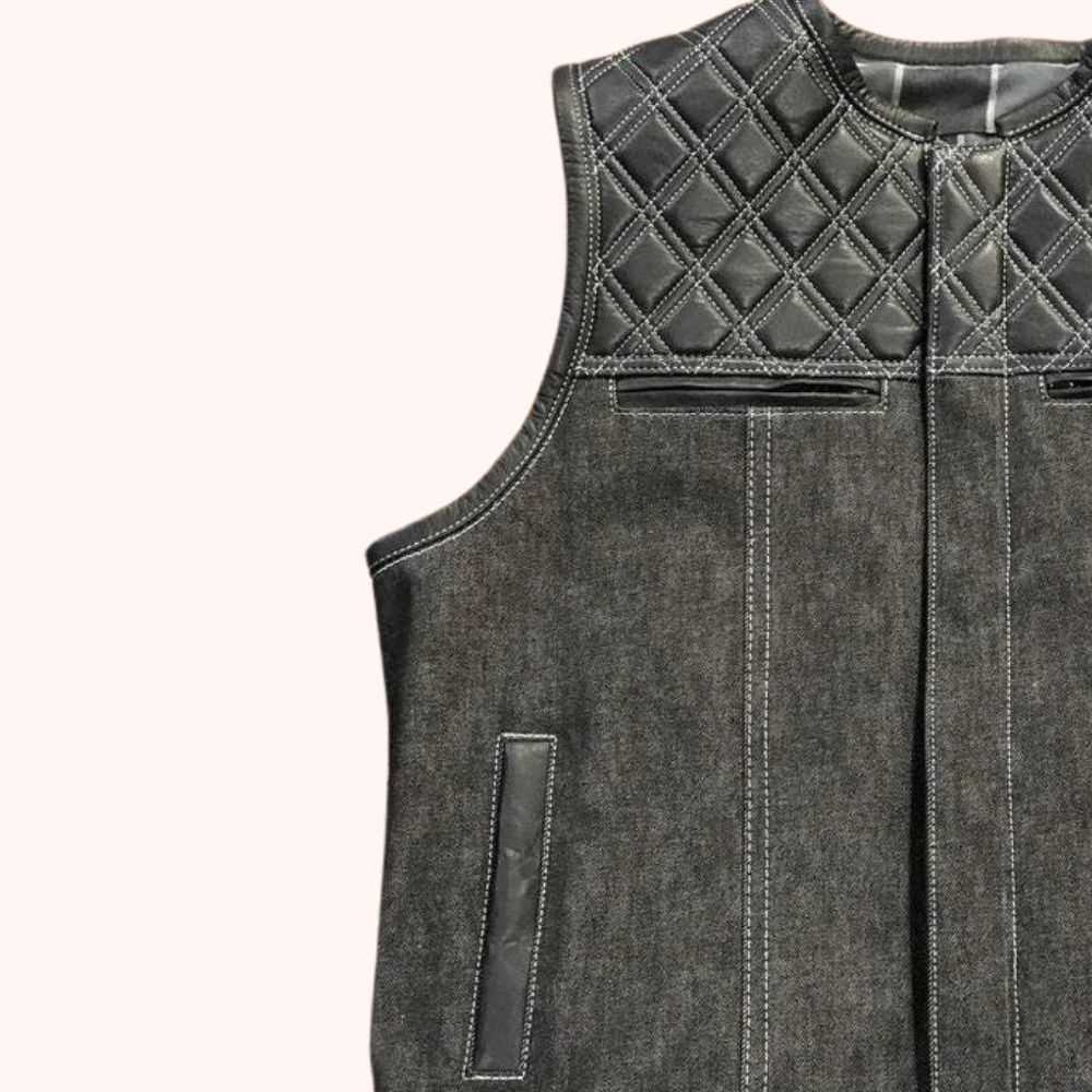 Men's distressed denim biker vest detail