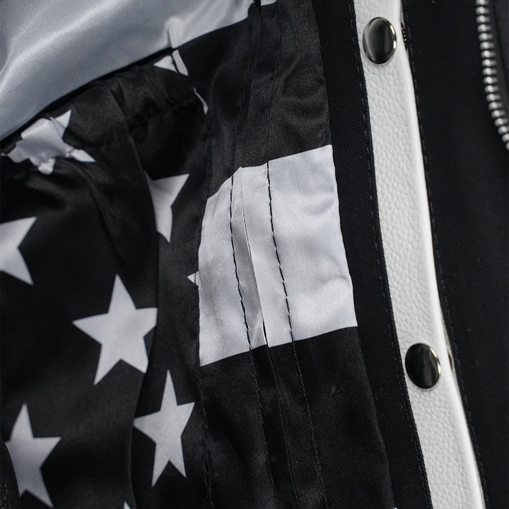 Black riding vest detail
