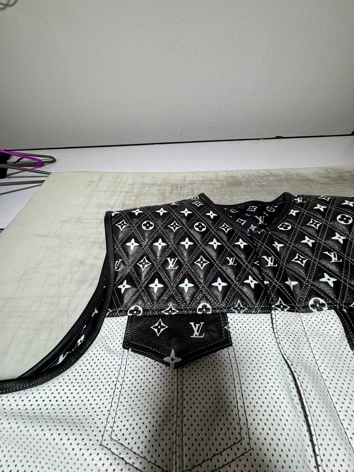LO*UIS VUIT**N WHITE LEATHER DIAMOND STITCHING WITH BLACK PERFORATED LEATHER
