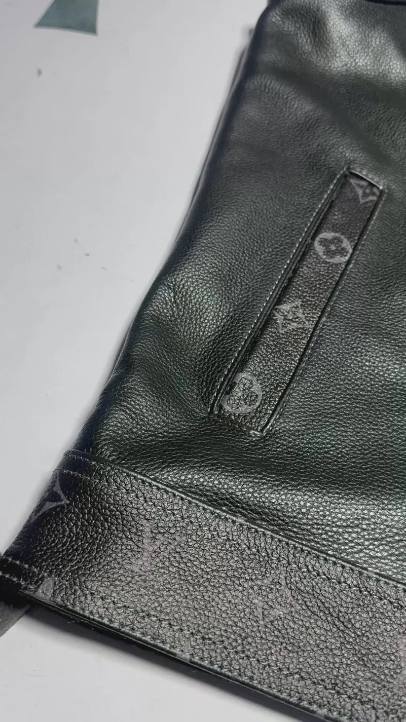 Premium black leather vest with concealed pockets